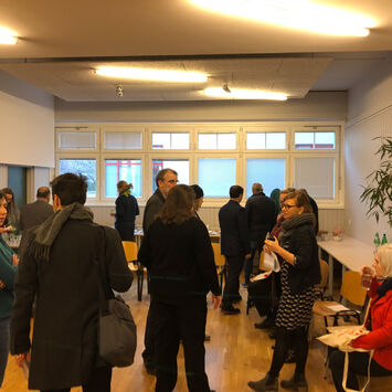 Delegation zu Gast im BewohnerInnen-Zentrum Bassena 12