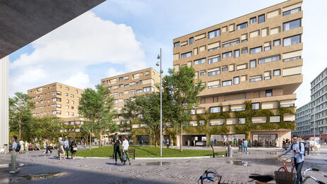 mehrere moderne Wohngebäude mit begrünten Fassaden umgeben einen öffentlichen Platz mit Bäumen und Menschen